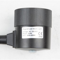 Work light with magnetic fastening